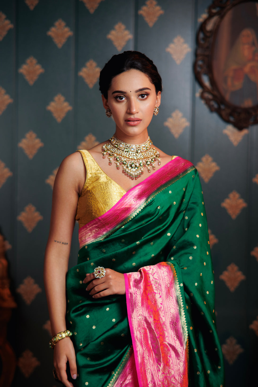 Elegant Green Handwoven Silk Saree with Vibrant Pink Contrast Border, a fusion of grace and vibrance, creating a stunning ensemble.