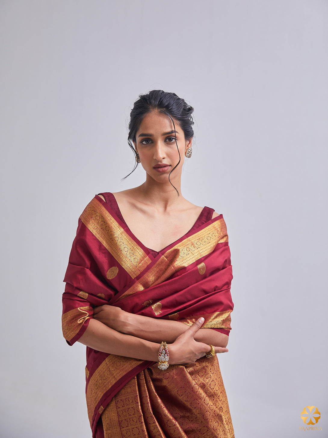 Timeless Maroon Handwoven Kanjivaram Saree - Elegance and Tradition Unveiled.
