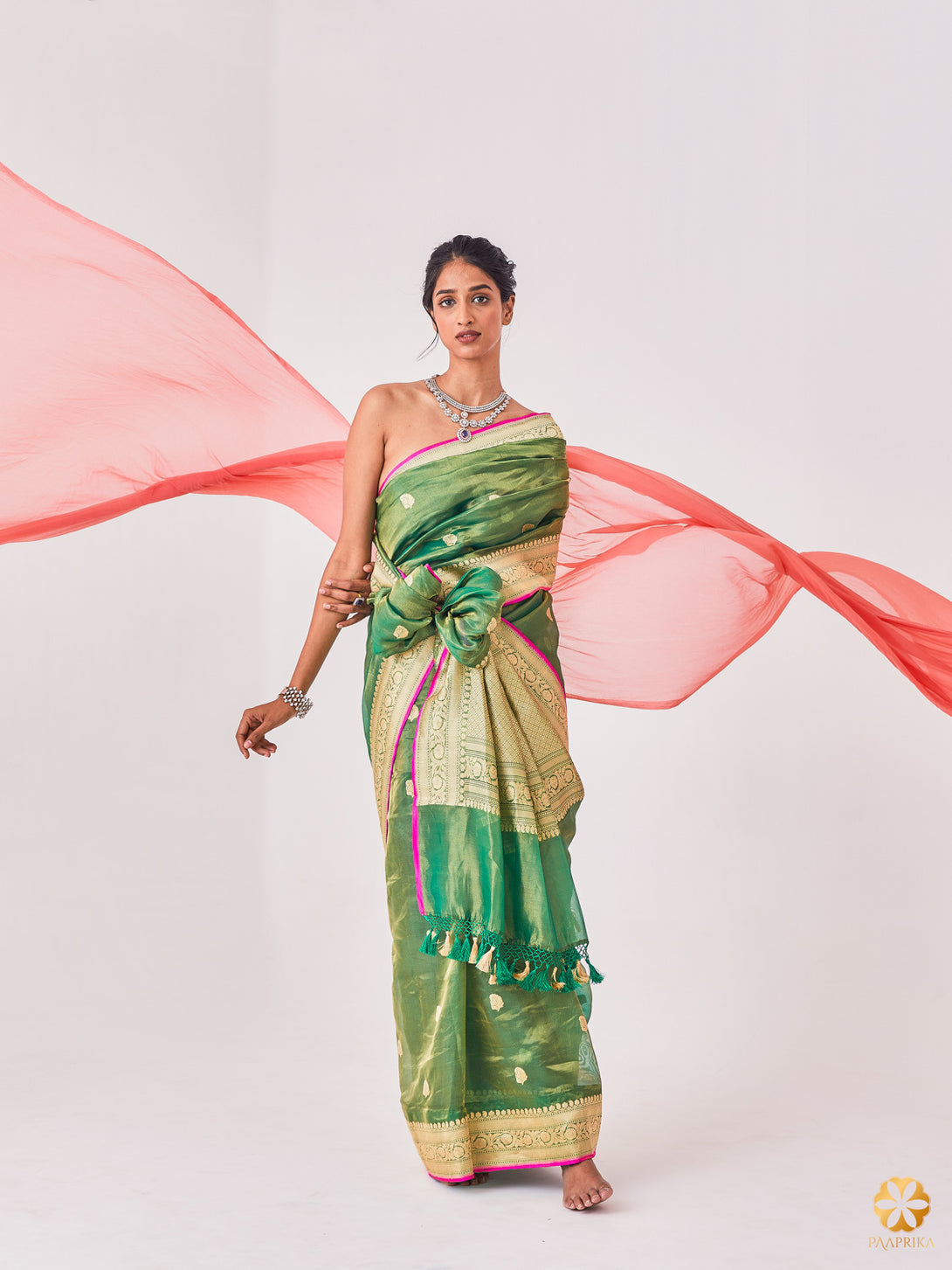Exquisite Bottle Green and Gold Handwoven Tissue Saree with Contrast Popping Pink Selvedge - Sophistication and Charm Combined.