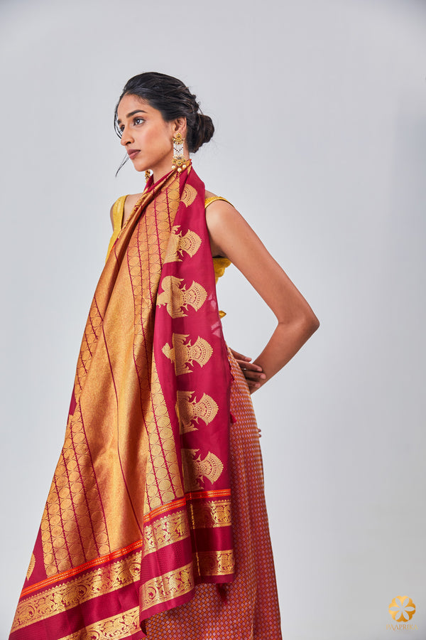Regal Maroon Kanjivaram Saree - Elegant Silk Saree with Paaimadi and Gandaberunda Detailing.
