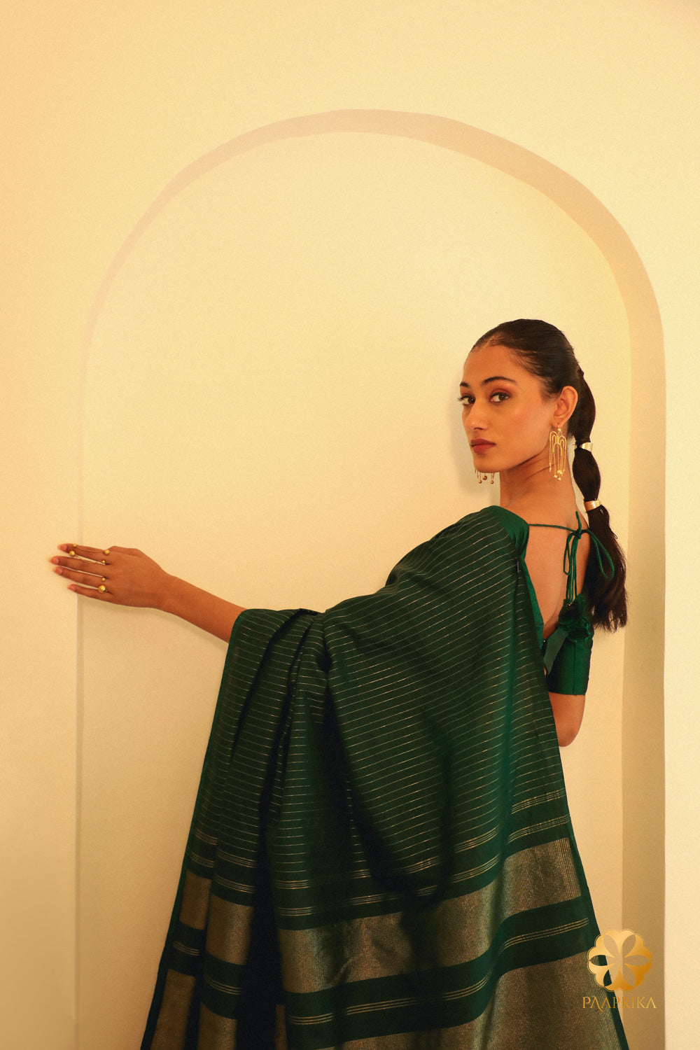Contemporary Vertical Stripes Add Modernity to the Saree.