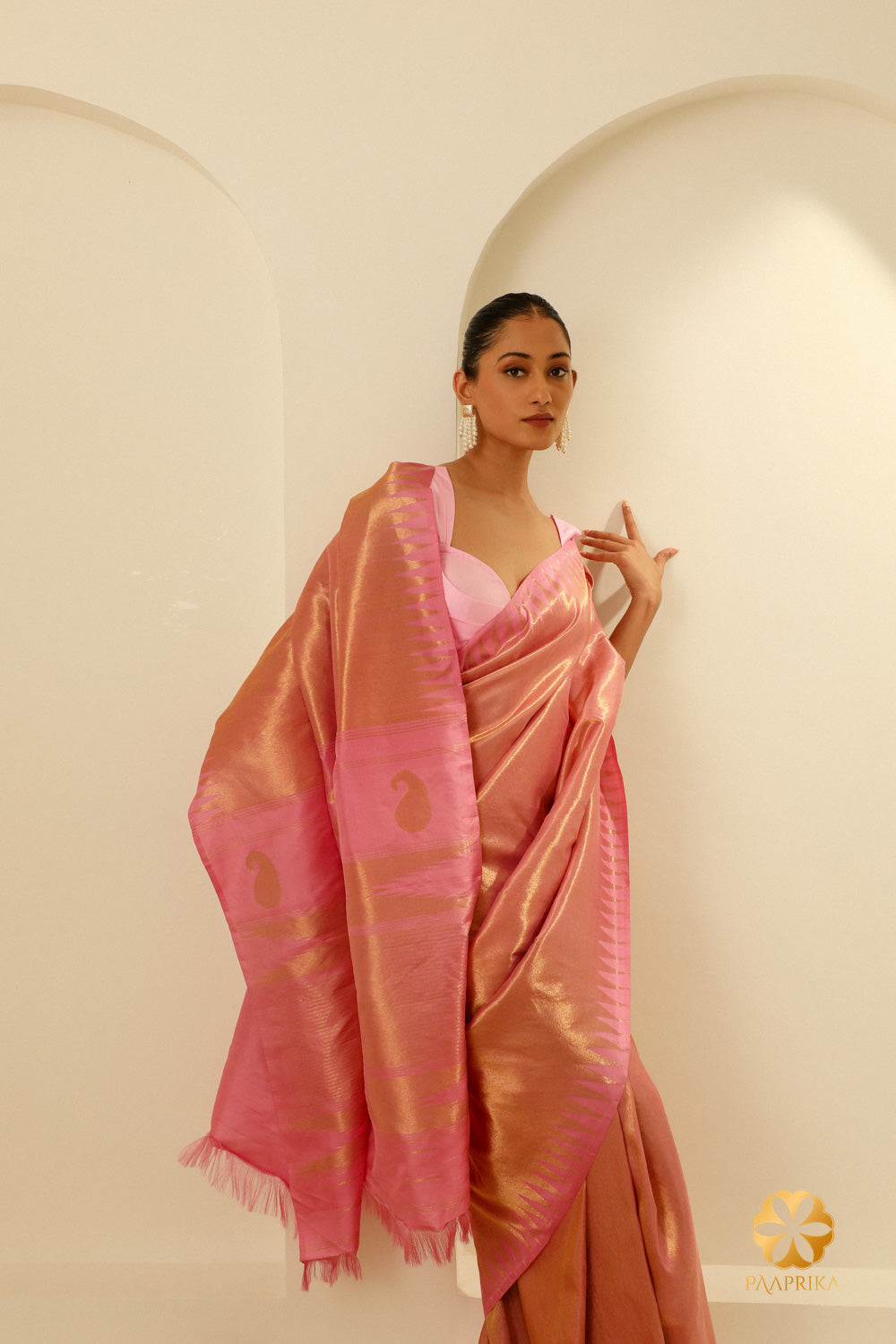 The entire Pastel Pink Kanjivaram Handwoven Saree displayed with a focus on its elegant design and cultural significance.