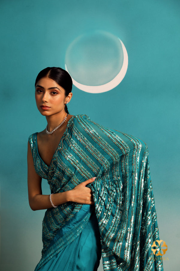 Teal Delight: Pure Georgette Saree with Intricate Triangular Pattern Embroidery