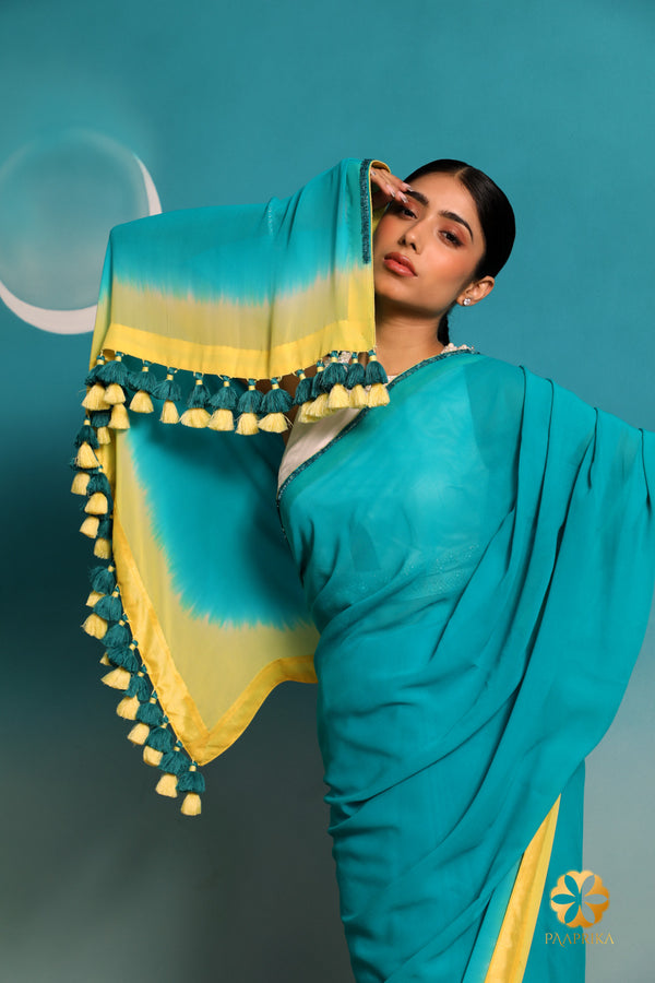 Teal Georgette Pure Saree with Hand-Embroidered Sequins and Teal/Yellow Tassels