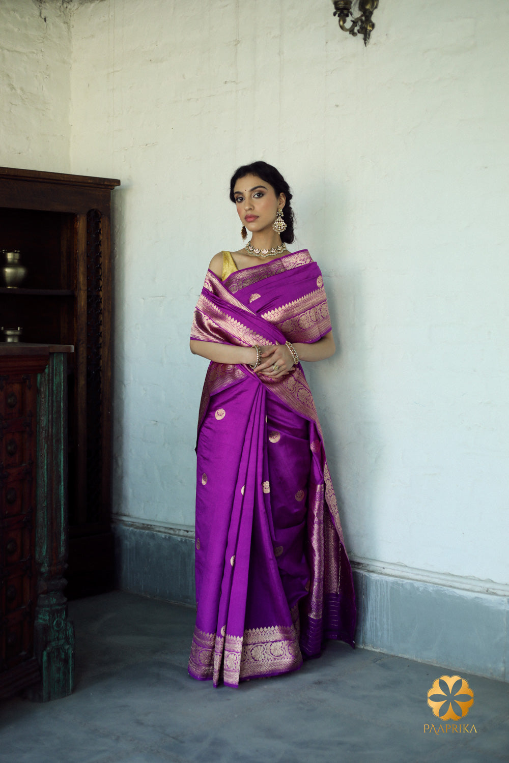 Graceful violet pure silk saree featuring meticulously woven chand buta motifs, offering a perfect blend of tradition and contemporary charm.