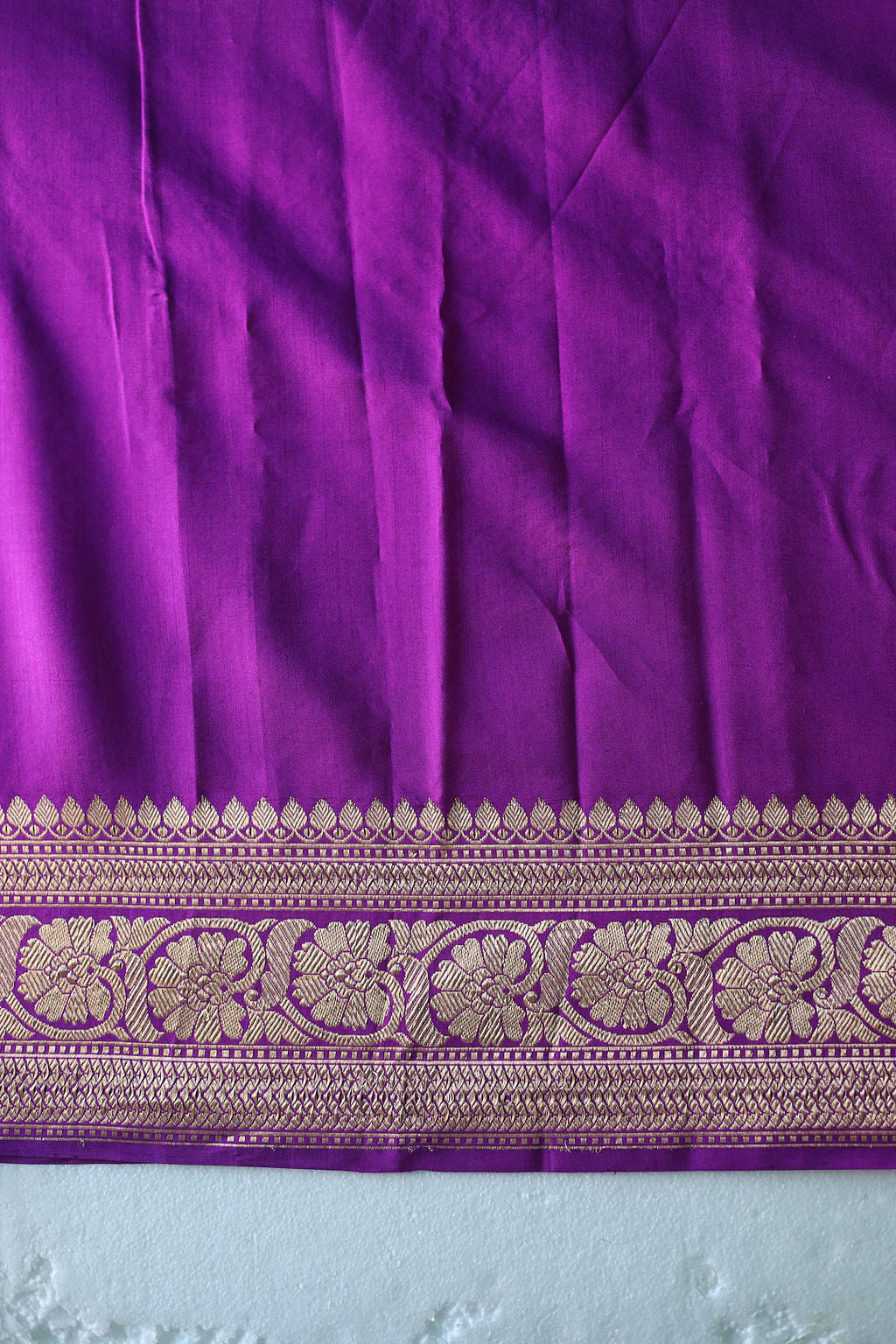 Graceful violet pure silk saree featuring meticulously woven chand buta motifs, offering a perfect blend of tradition and contemporary charm