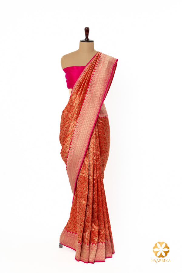 Detailed view of the vibrant hot pink border of the Banarasi Saree.