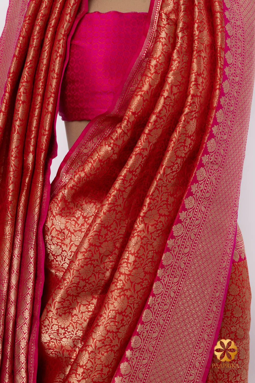 A folded section of the saree, highlighting the brocade patterns.