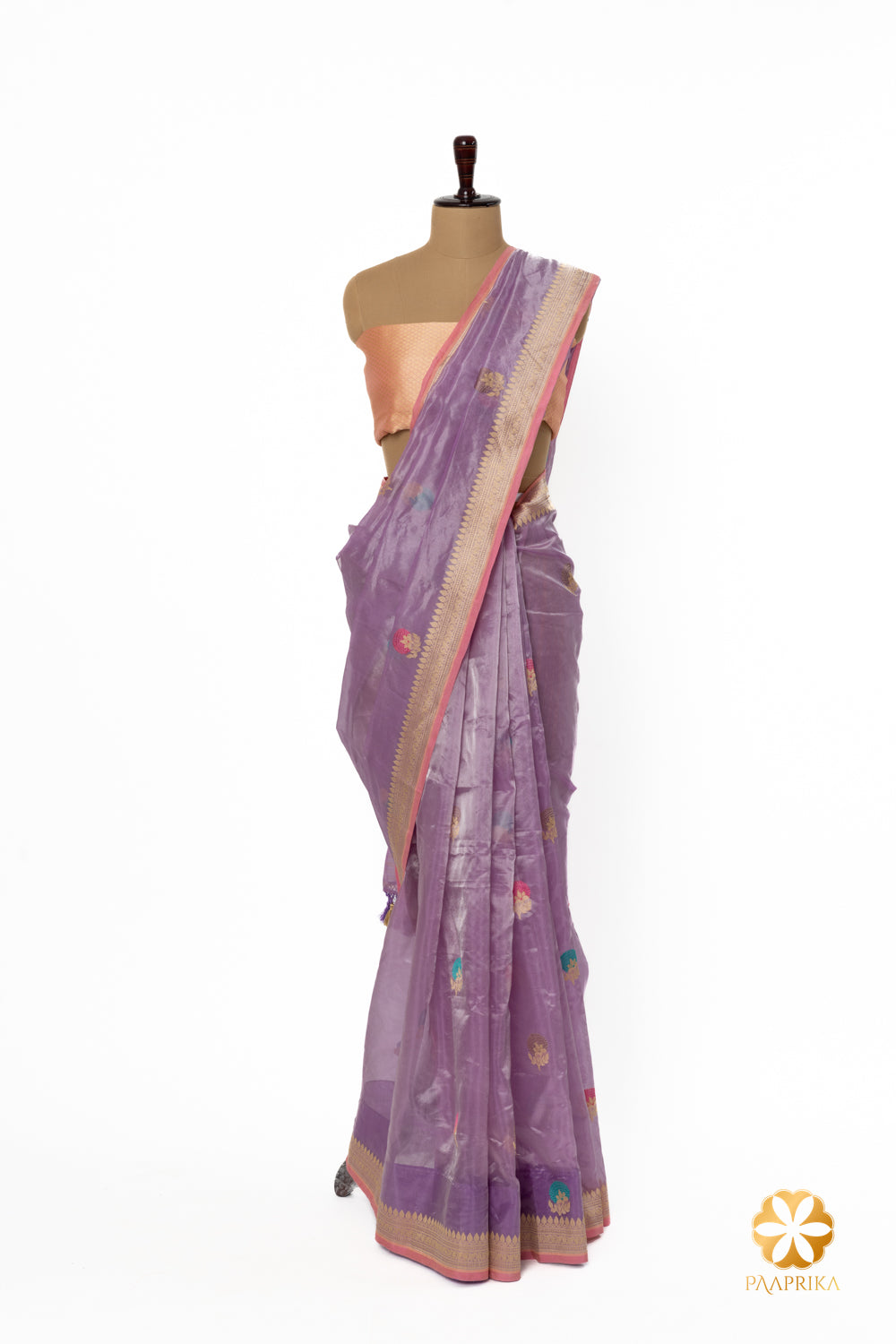 Luxurious tissue fabric of the lavender Banarasi saree, ensuring comfort.
