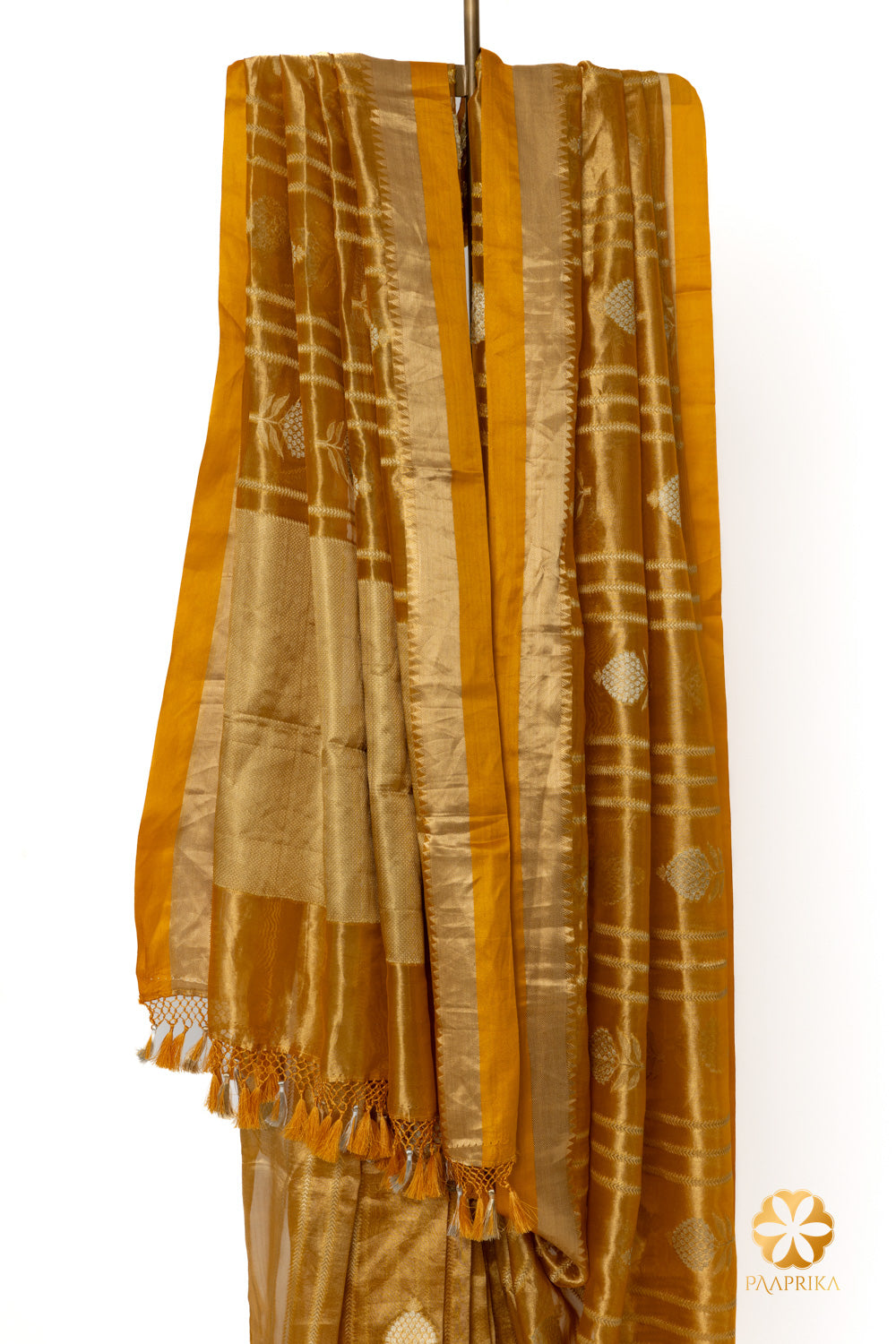 Elegant golden mustard saree featuring a blend of tradition and modernity.