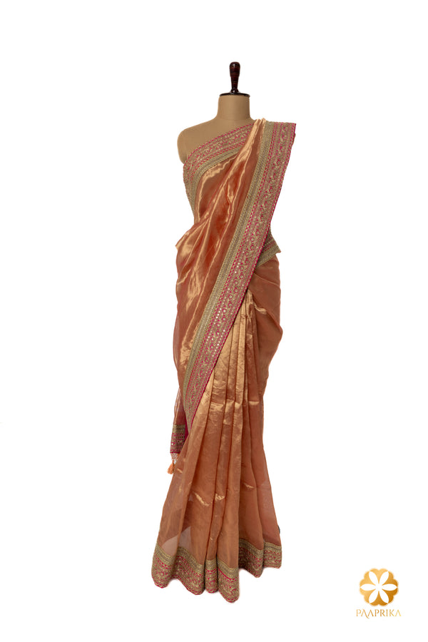 Gold Handcrafted Tissue Saree with Pink Contrast Embellished Border