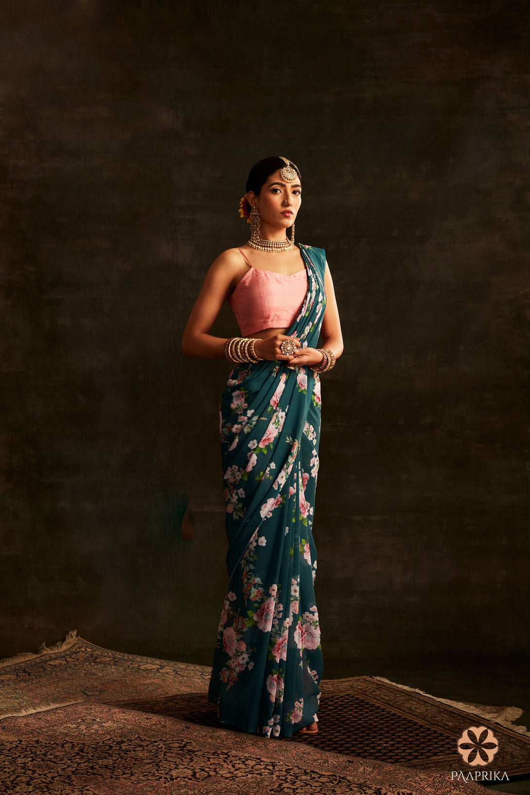 Exquisite Teal Green Floral Printed Georgette Saree, a stunning choice adorned with graceful blooms in serene hues.