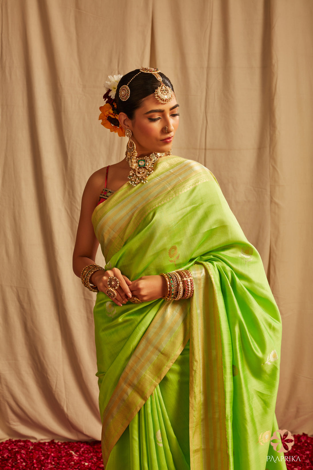 lime green spun silk saree with contrast pink blouse