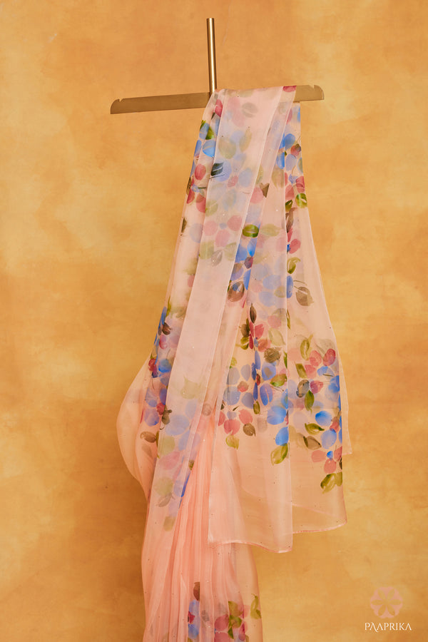 Pastel Peach Handpainted Organza Saree With Mukaish Embroidery